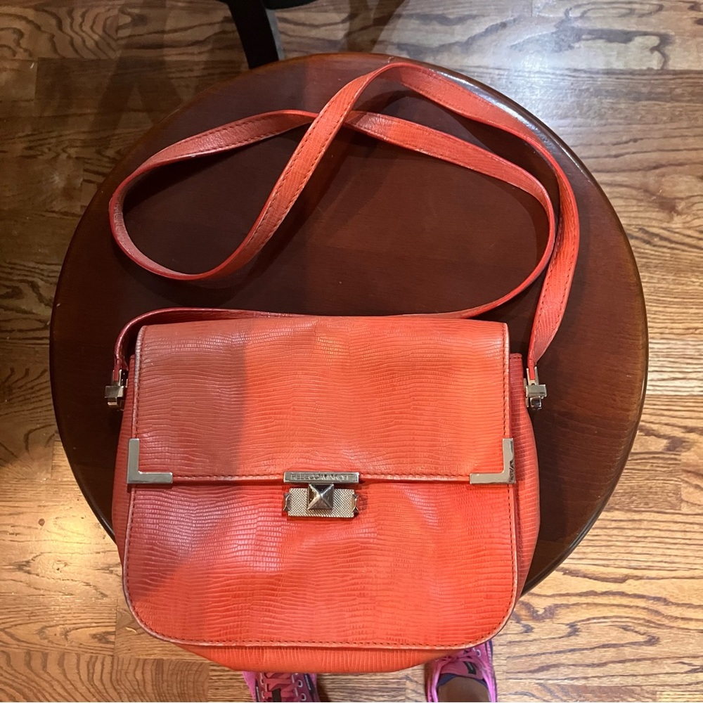 Rebecca Minkoff coral adjustable strap purse.